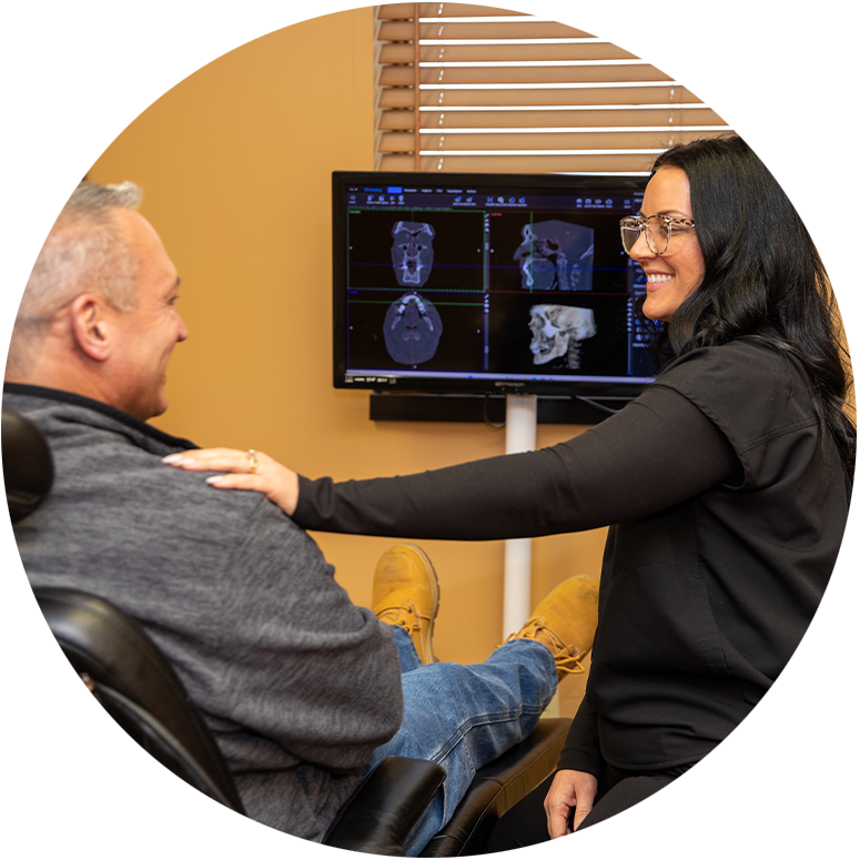 Patient smiling at team member