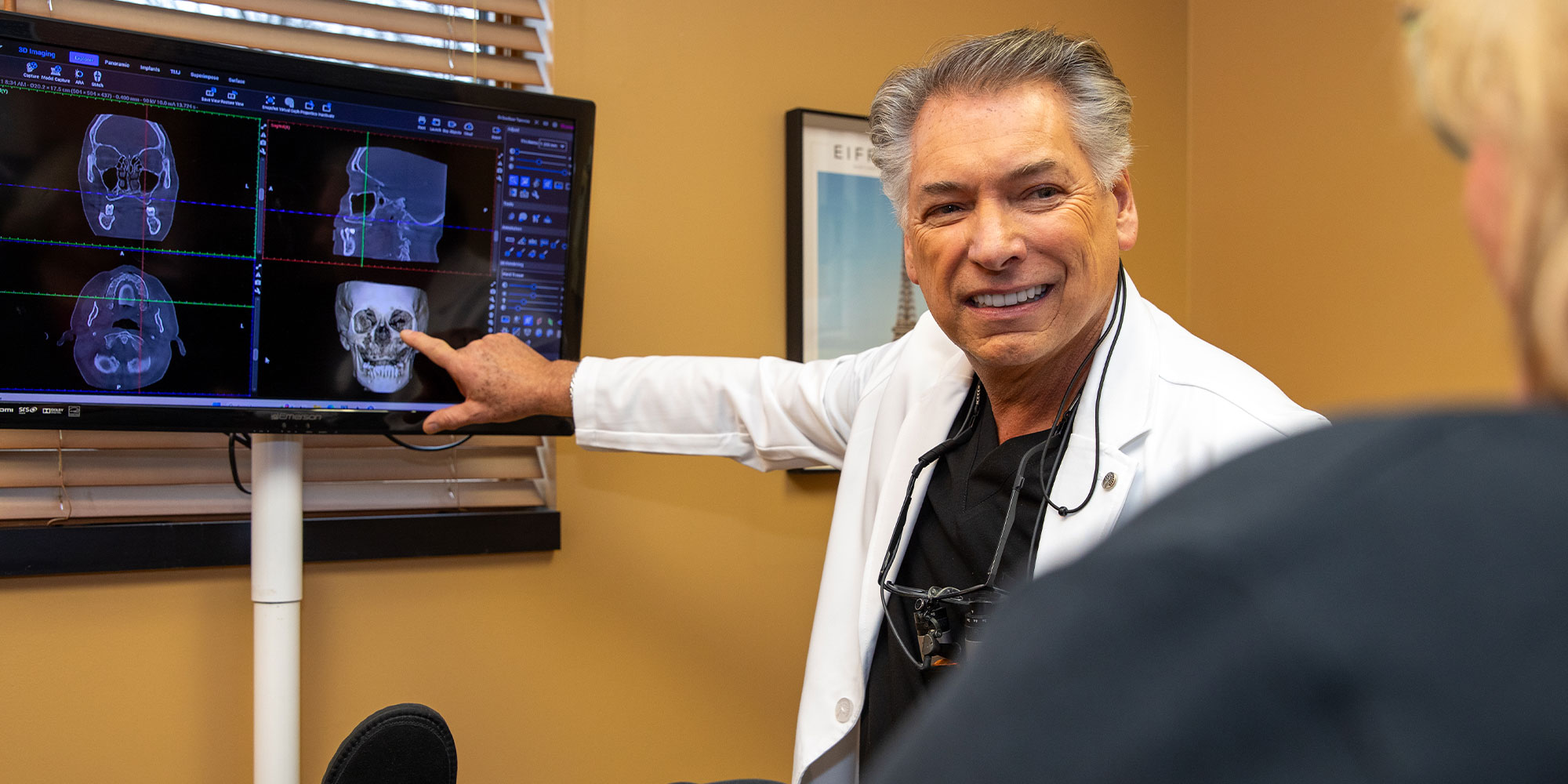 Doctor Pointing at dental x-ray